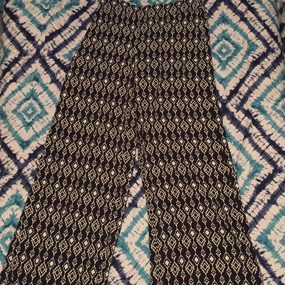 Flowy pants with white diamond design.